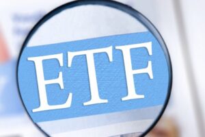 magnifying glass over the letters "ETF"